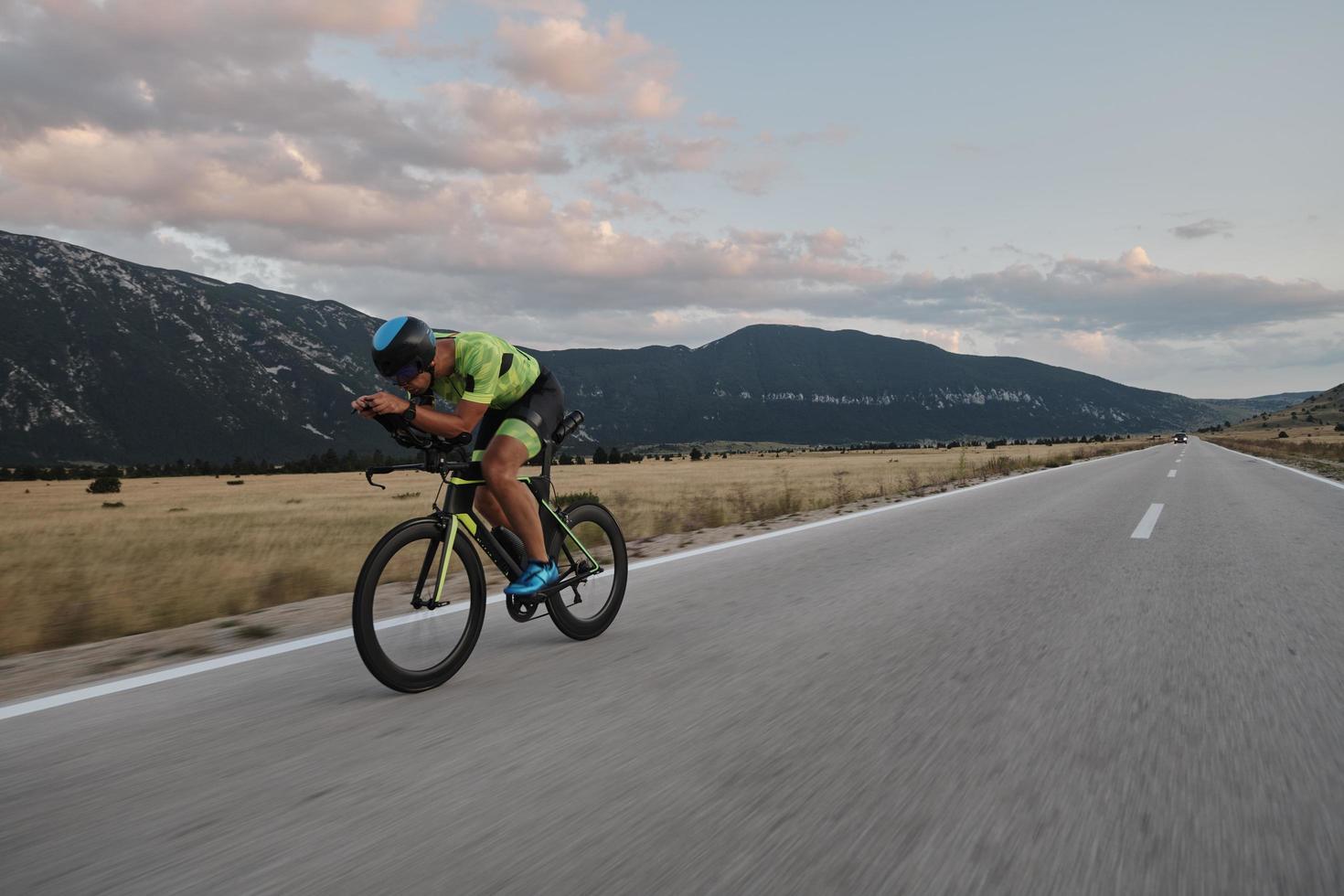 triathlon athlete riding bike photo