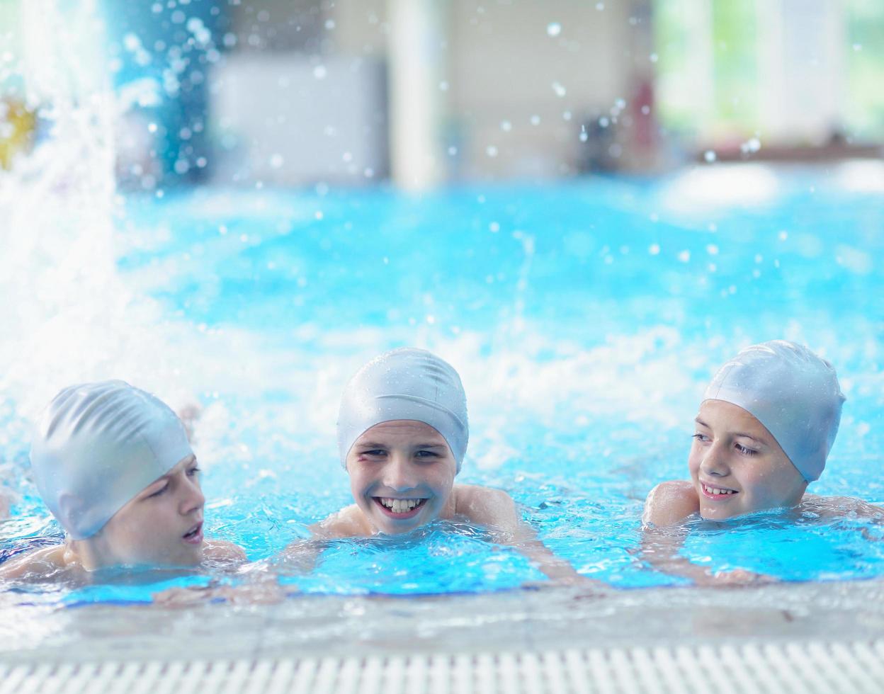 children group  at swimming pool photo