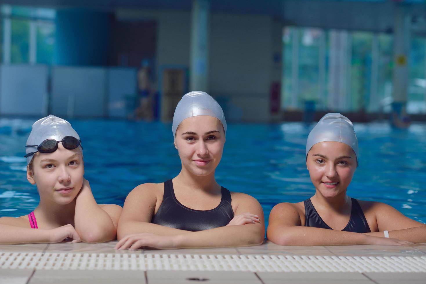 children group  at swimming pool photo