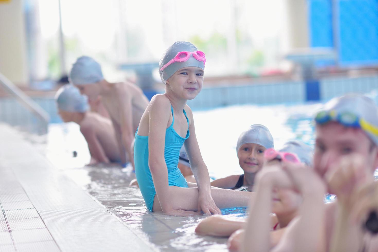 children group  at swimming pool photo