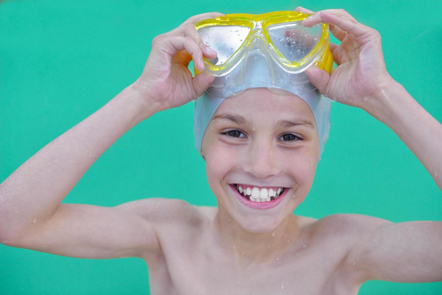 child portrait on swimming pool photo