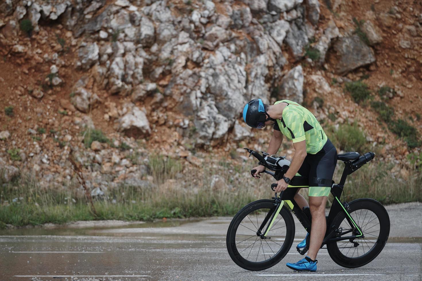 triathlon athlete riding bike photo