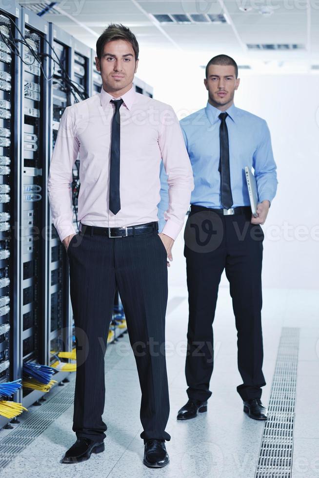 it engineers in network server room photo