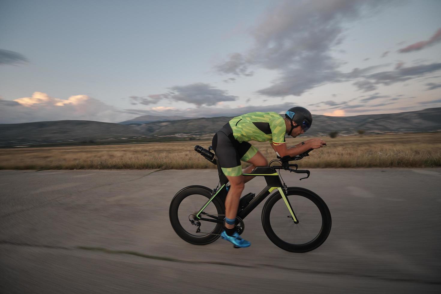 triathlon athlete riding a  bike photo