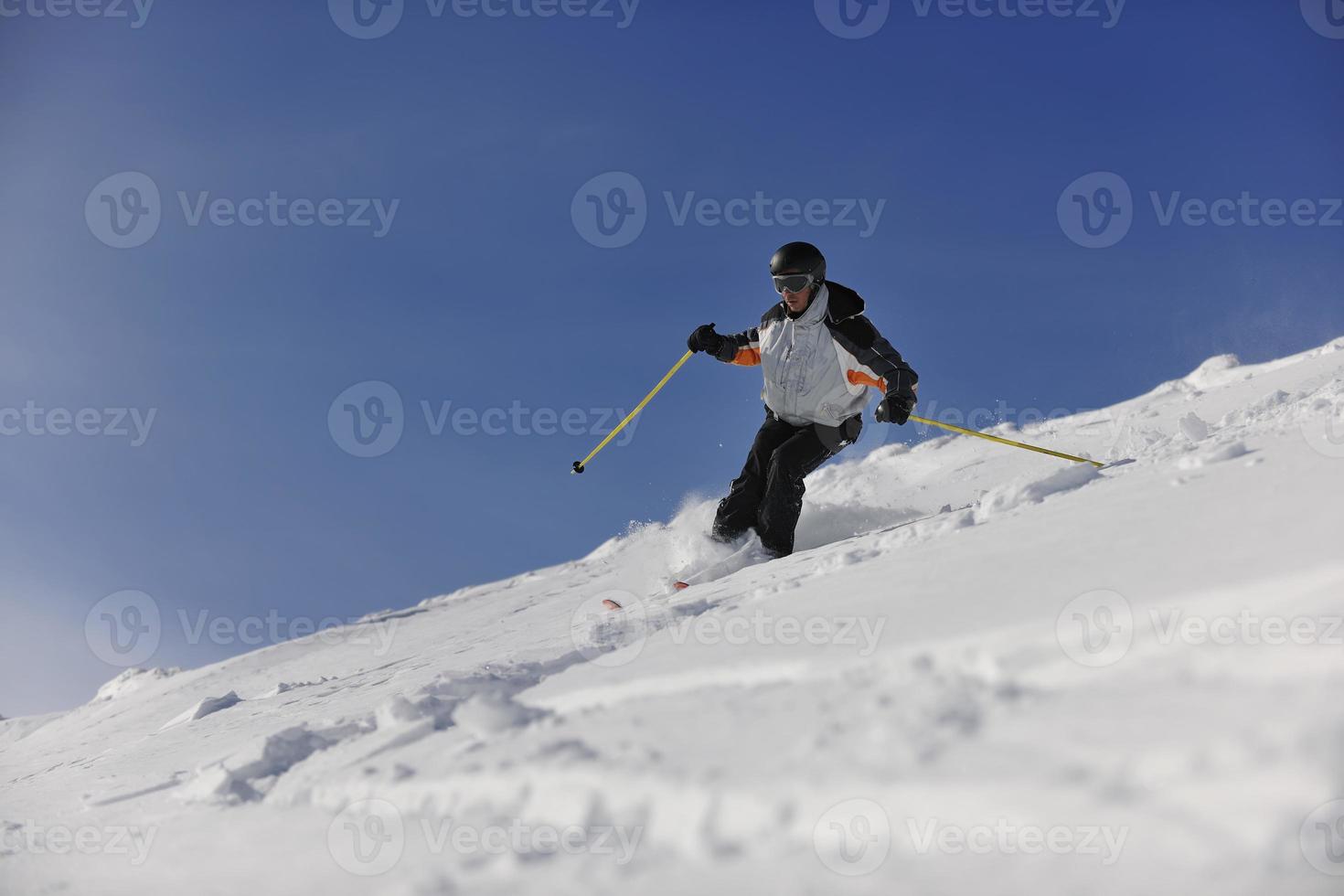 Skier on mountain photo