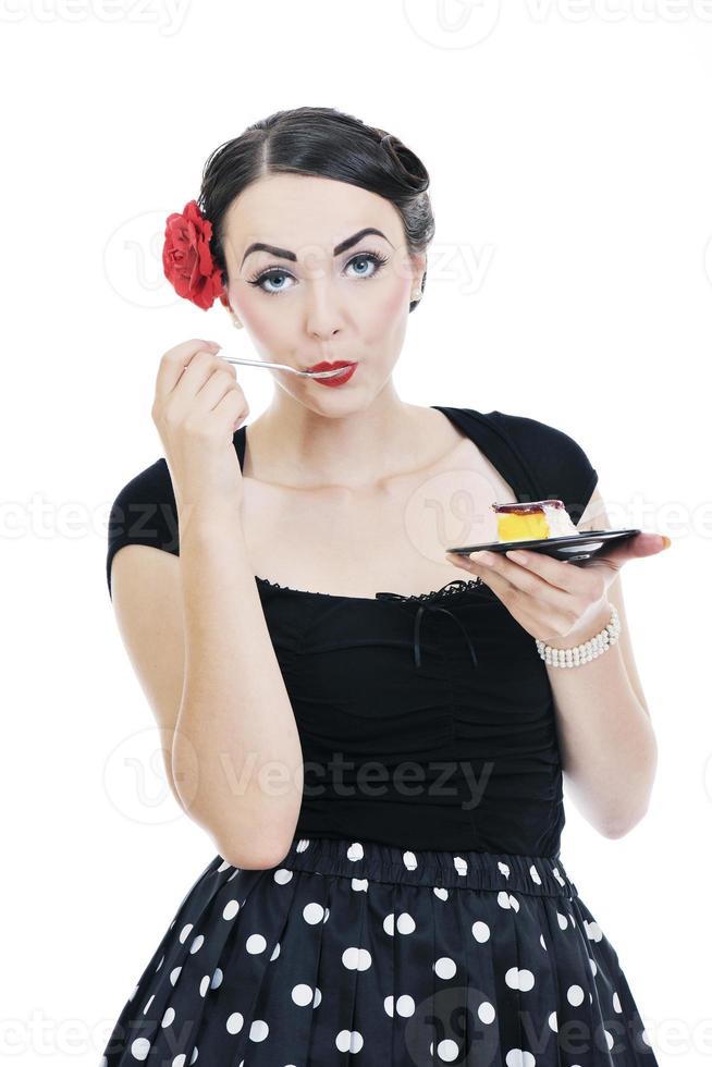 beautiful young woman eat sweet cake photo