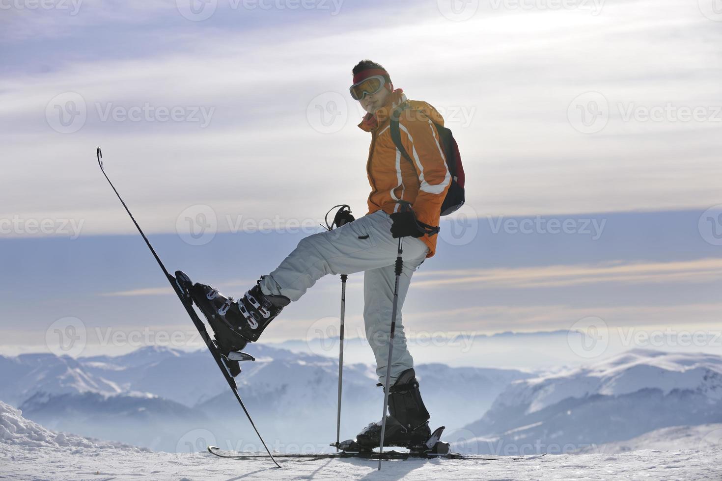Skier on mountain photo