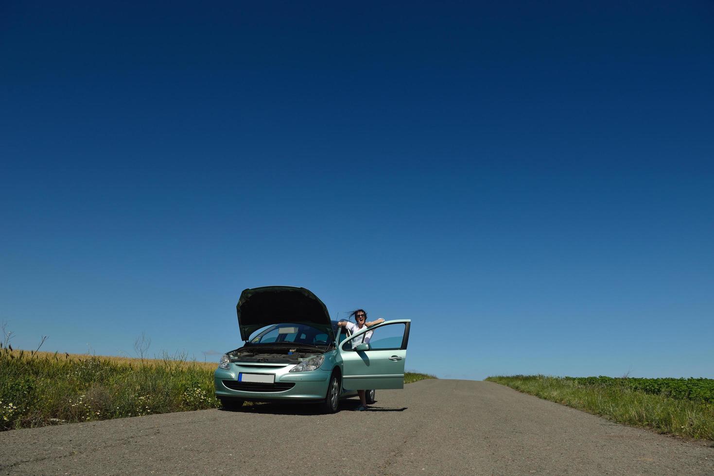woman with broken car photo