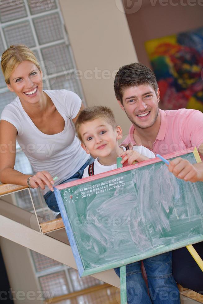 family drawing on school board at home photo