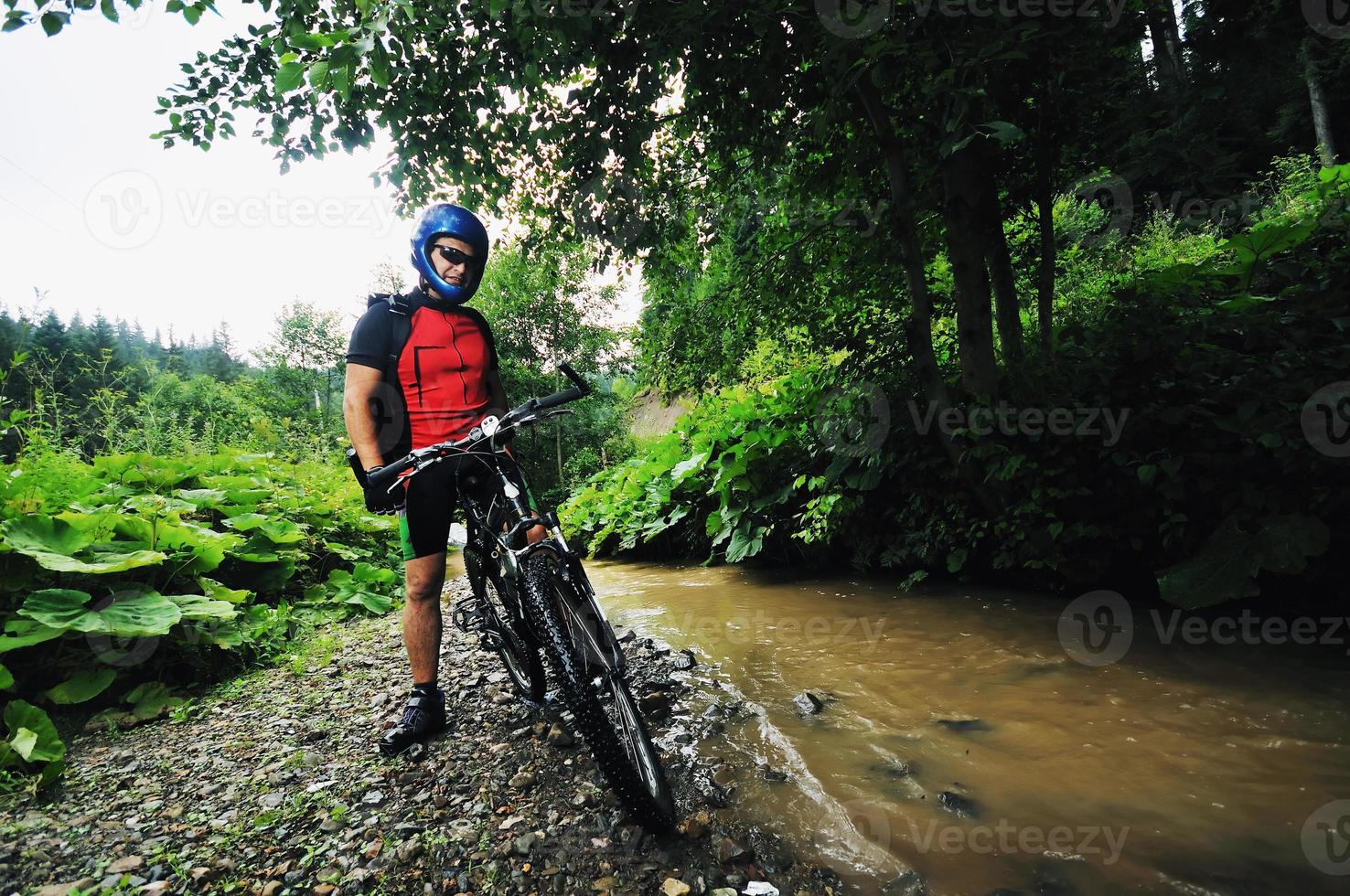 Man on bike photo