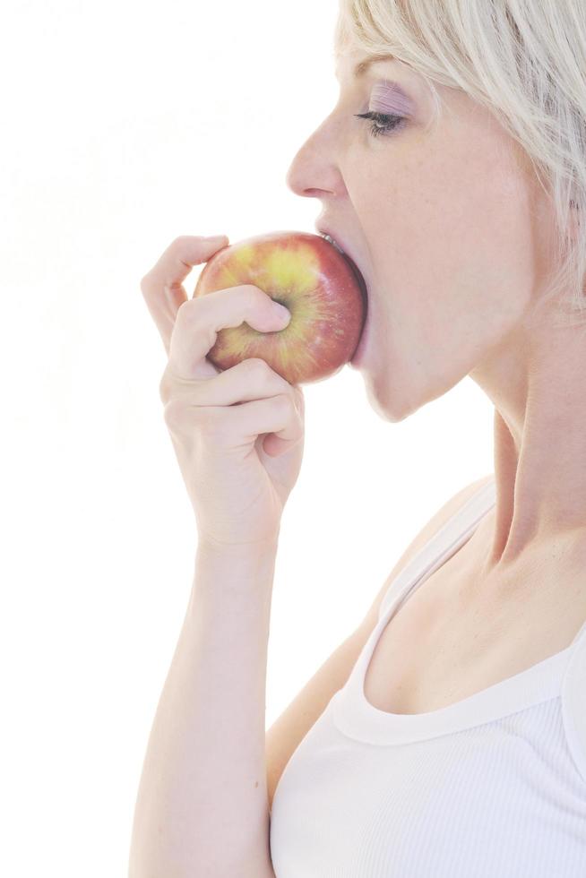 happy  young  woman eat apple isolated  on white photo