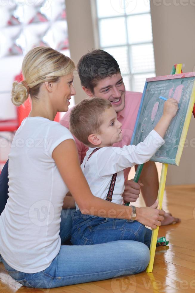 family drawing on school board at home photo