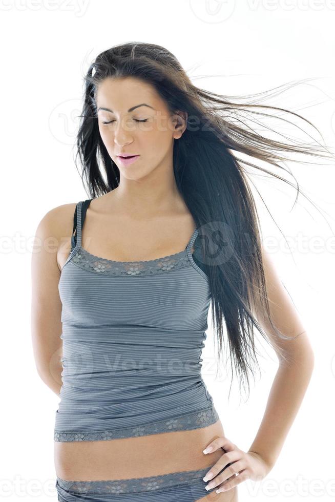 happy young girl isolated on white in studio photo
