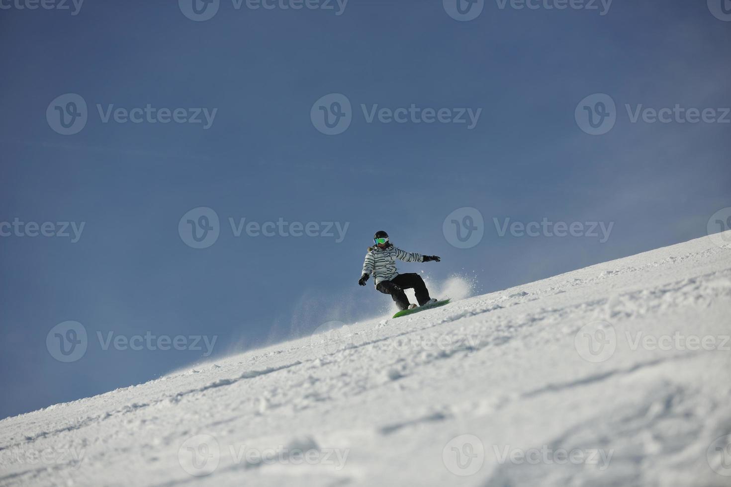 Skiers on mountain photo