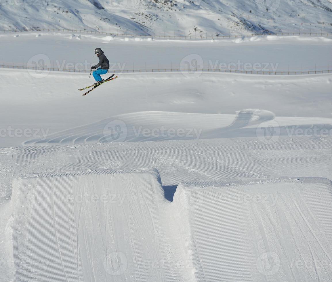 Skiers on mountain photo