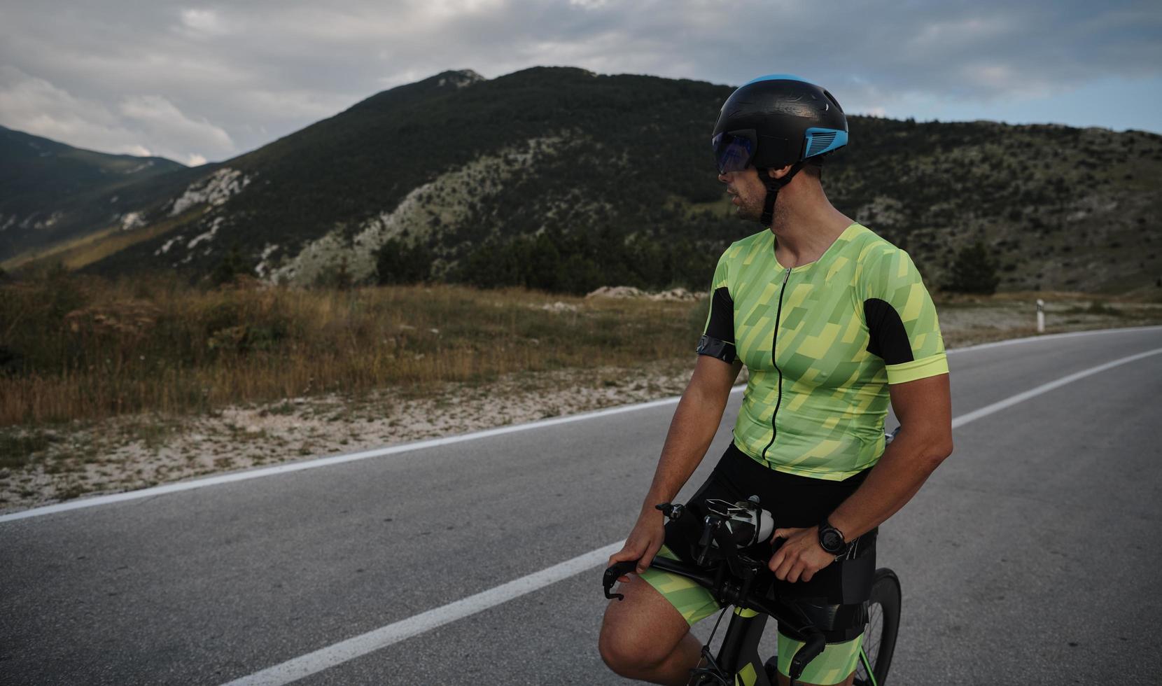 triathlon athlete riding bike photo