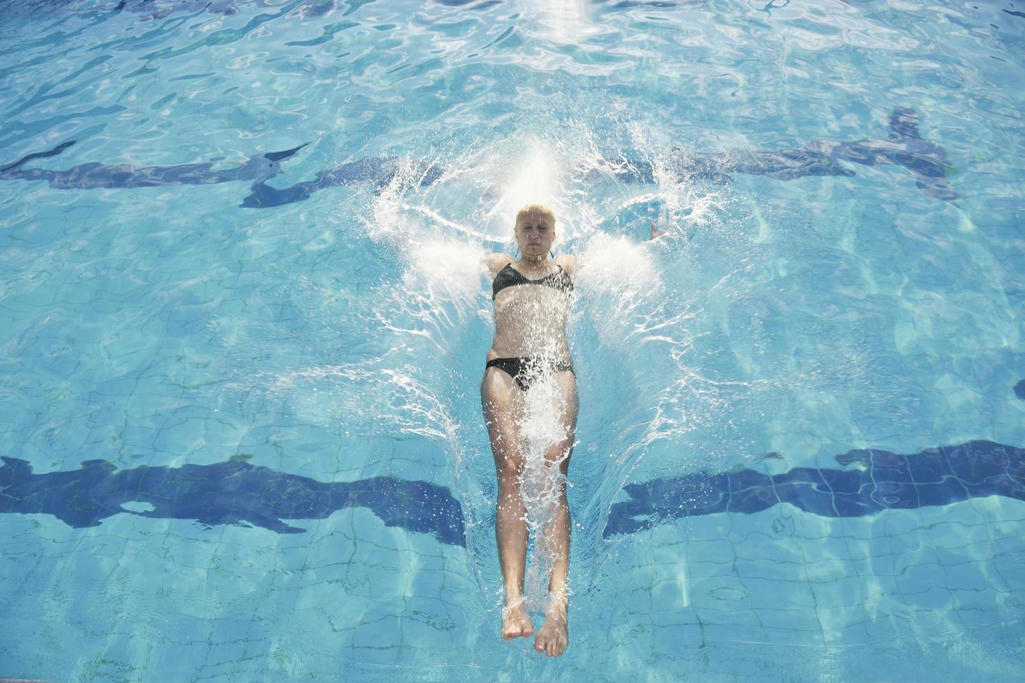 woman relax on swimming pool photo
