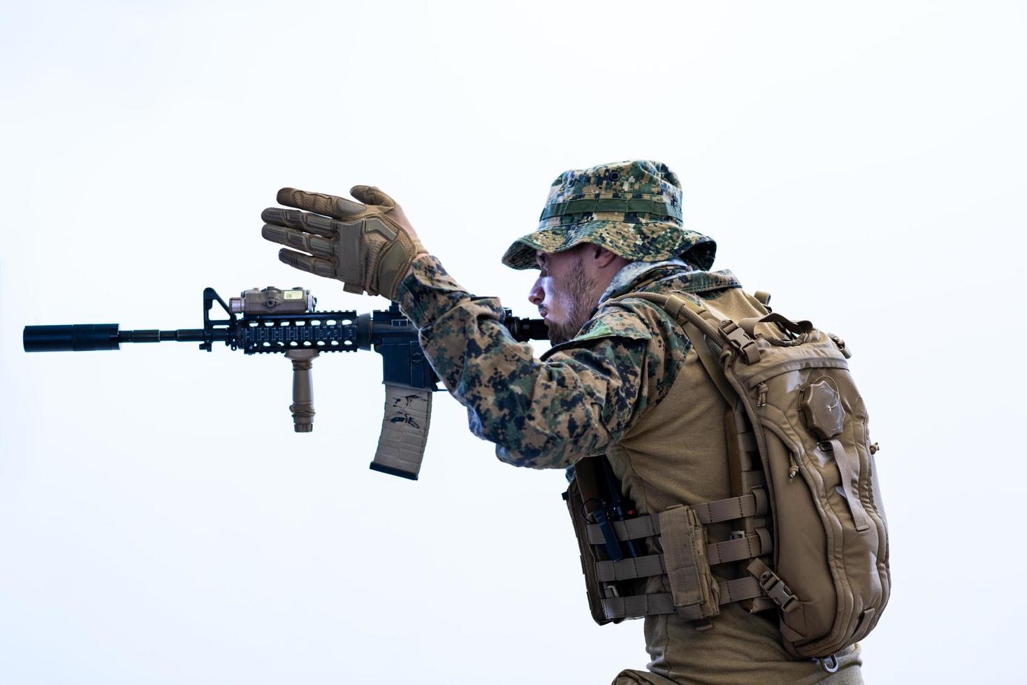 soldier in action aiming laseer sight optics photo