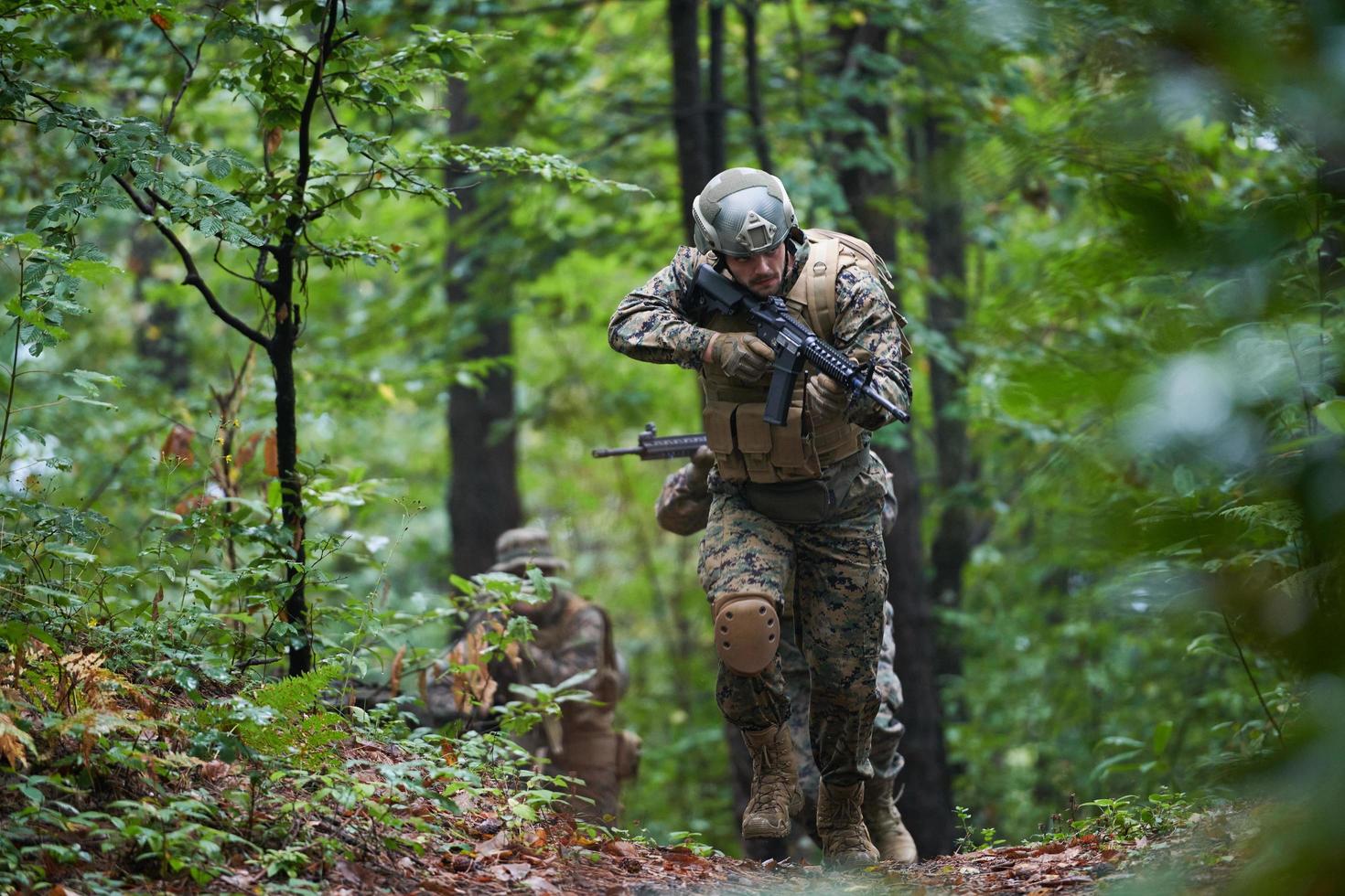 Modern warfare Soldiers  Squad  in battle photo