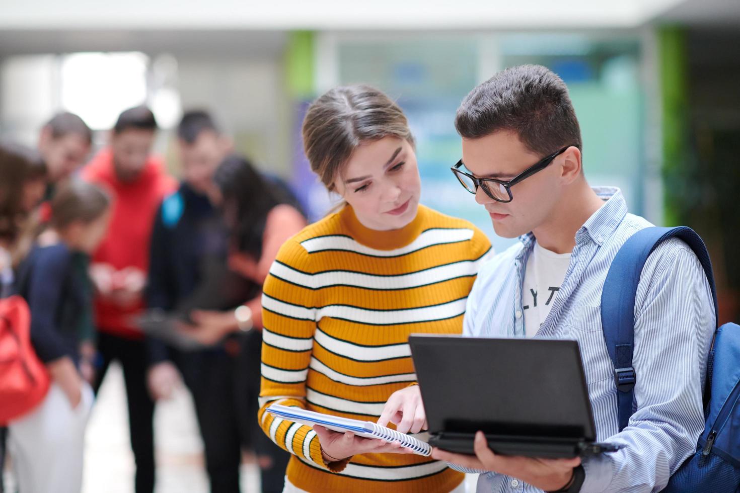students using modern technology in school photo