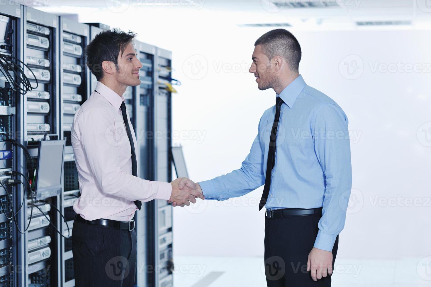 it engineers in network server room photo