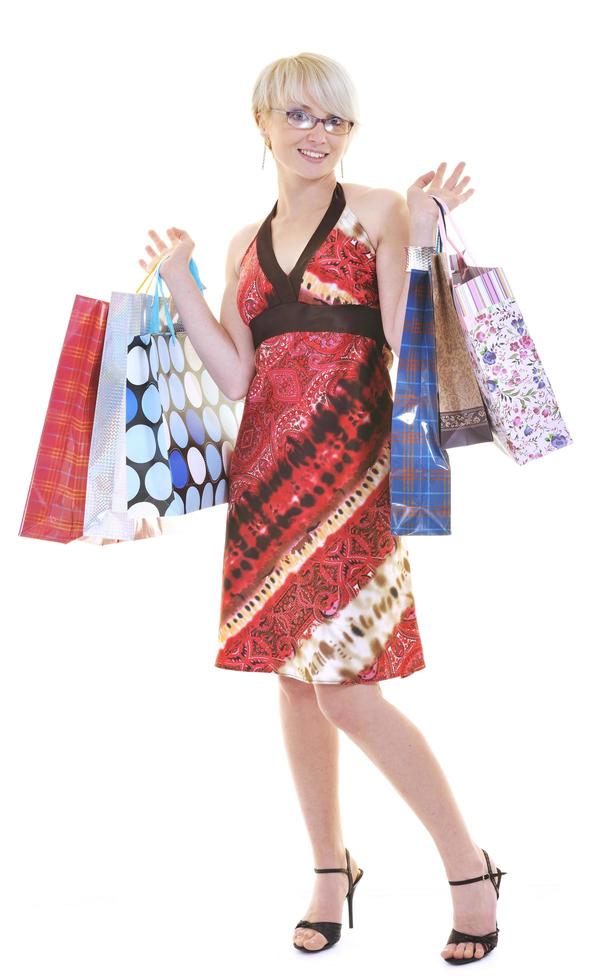 happy young adult women  shopping with colored bags photo