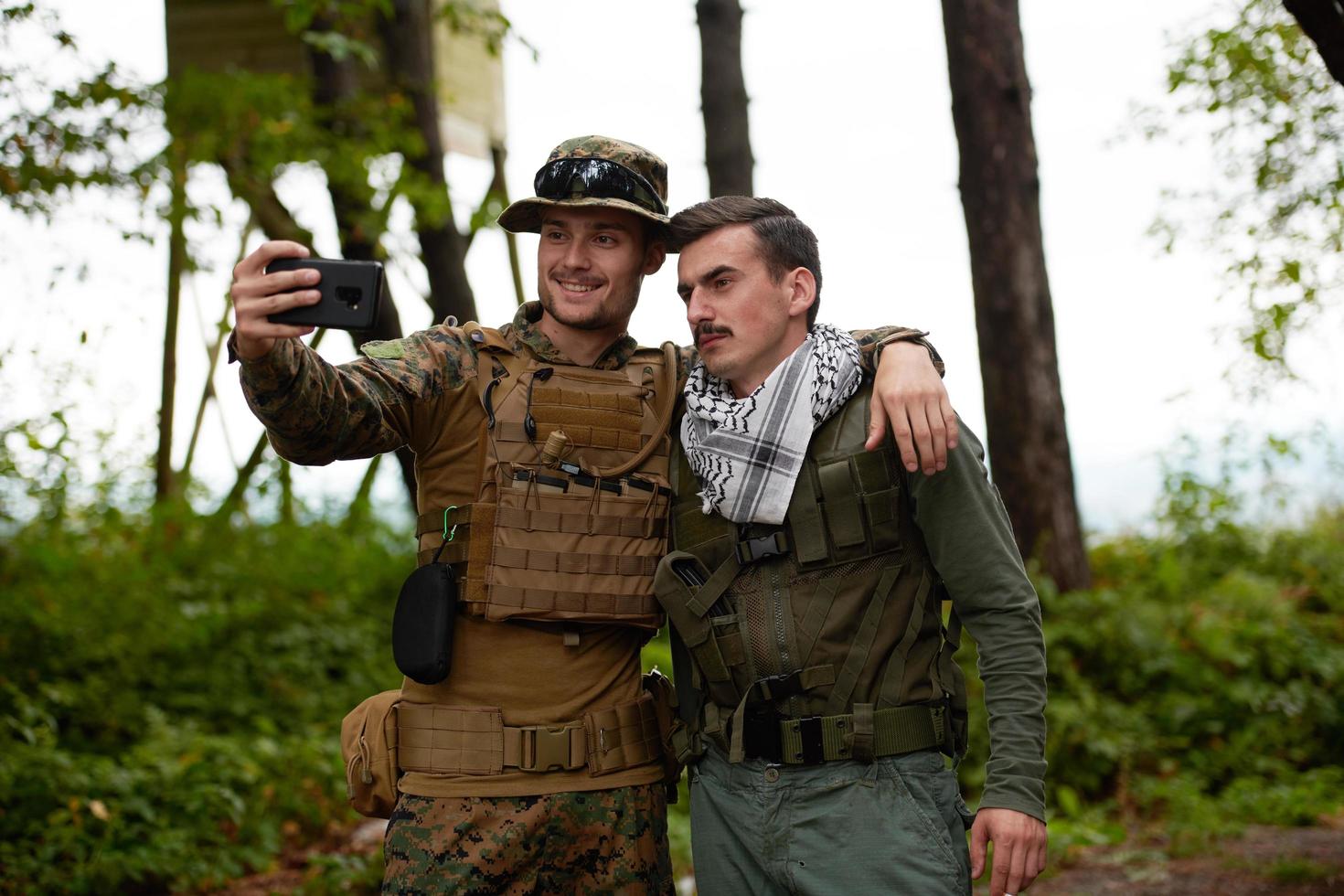 soldiers and terrorist taking selfie photo