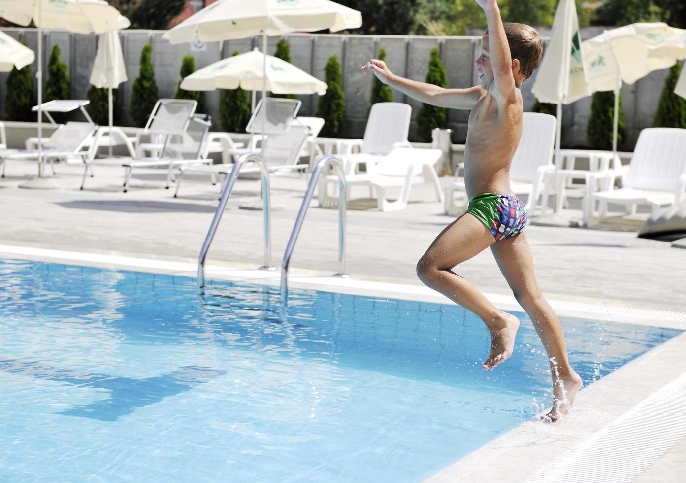 children on swimming pool photo