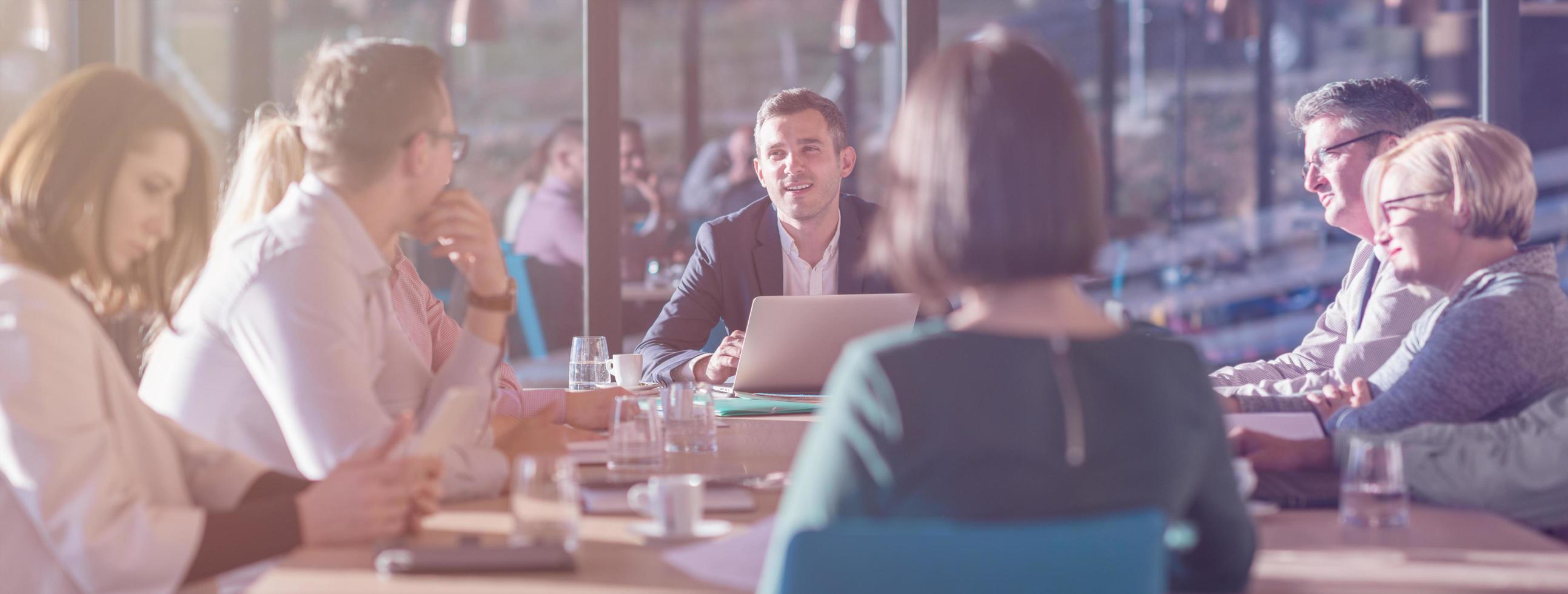 young business team on meeting at office photo