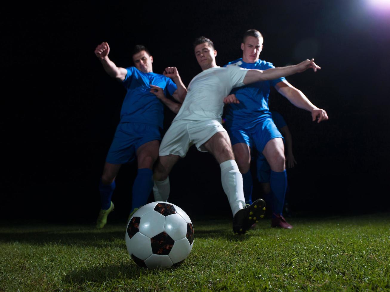 soccer players duel photo