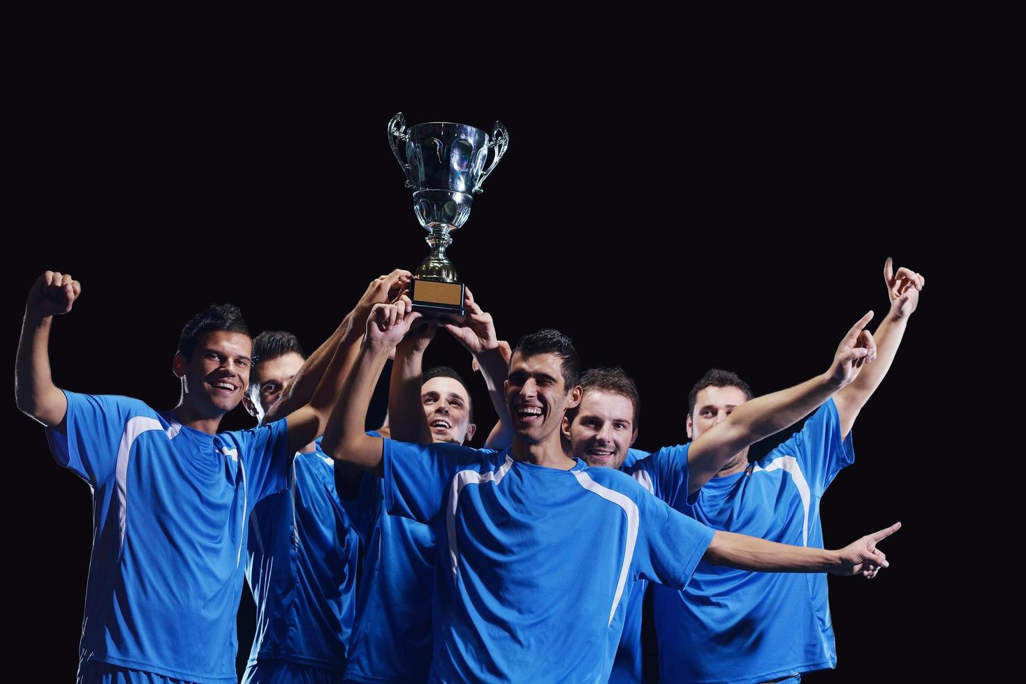 soccer players celebrating victory photo