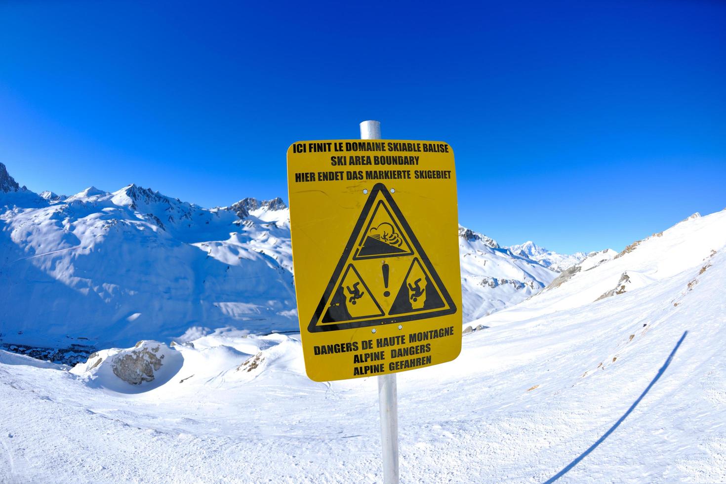 Sign board at High mountains under snow in the winter photo