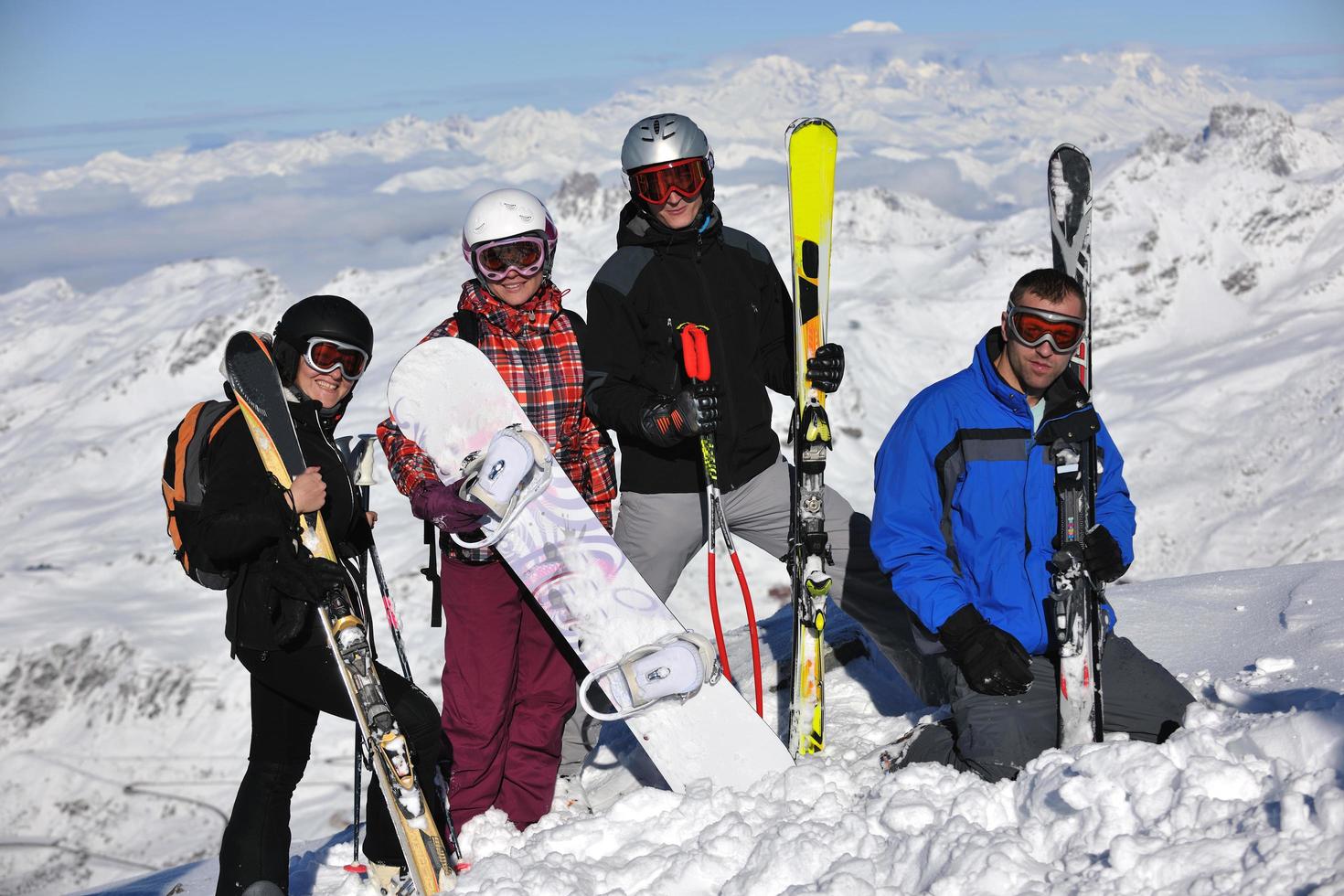 people group on snow at winter season photo