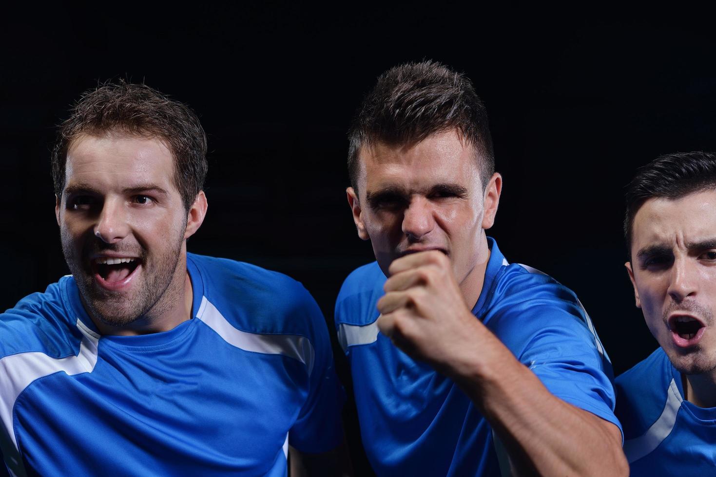 soccer players celebrating victory photo