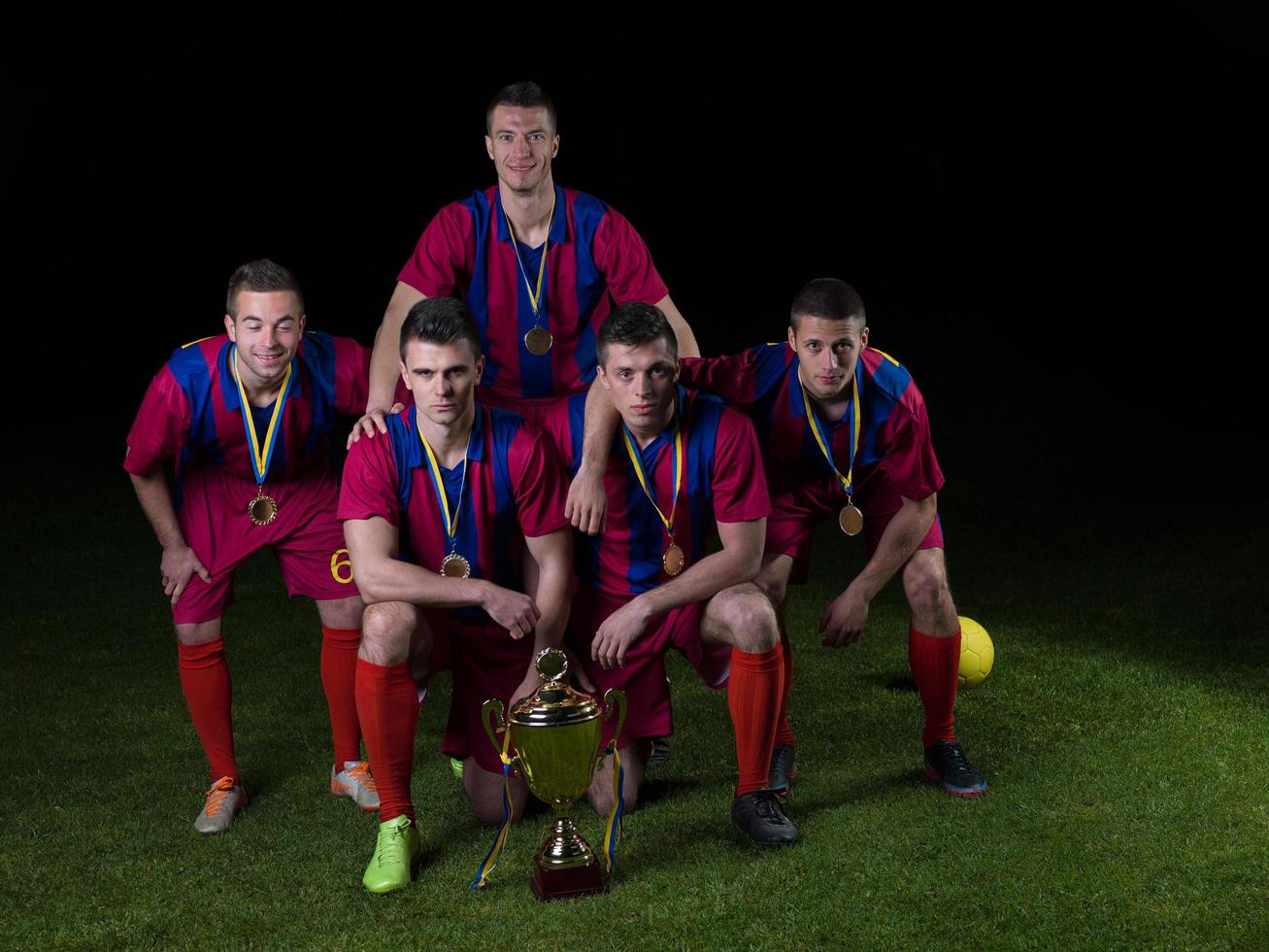 soccer players celebrating victory photo