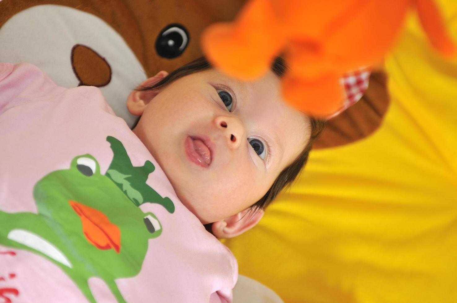 indoor portrait with happy young famil and  cute little babby photo