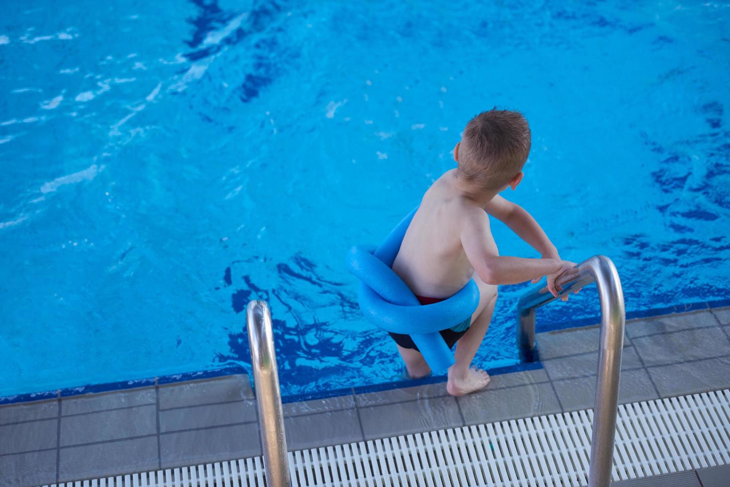 child portrait on swimming pool photo