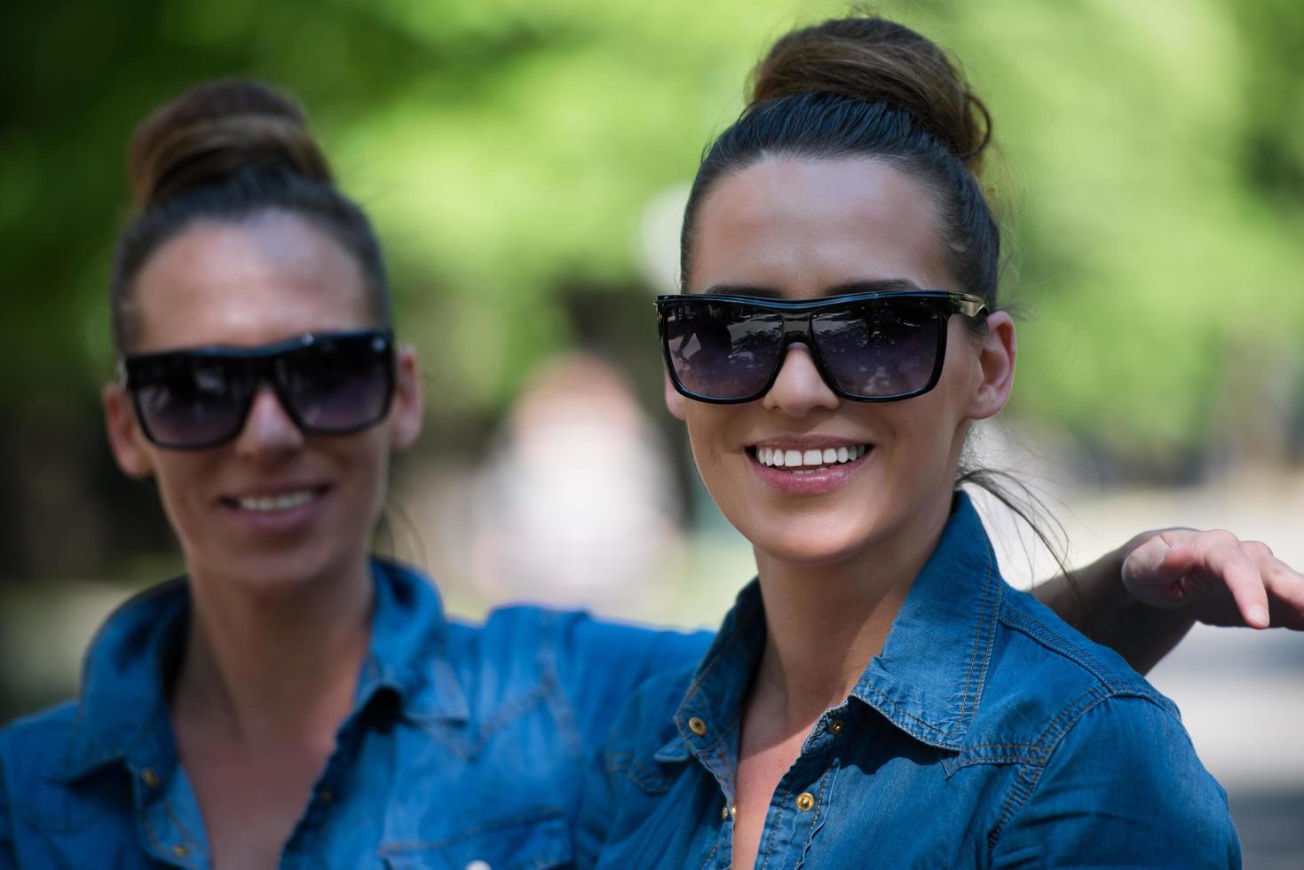 twin sister with sunglasses photo