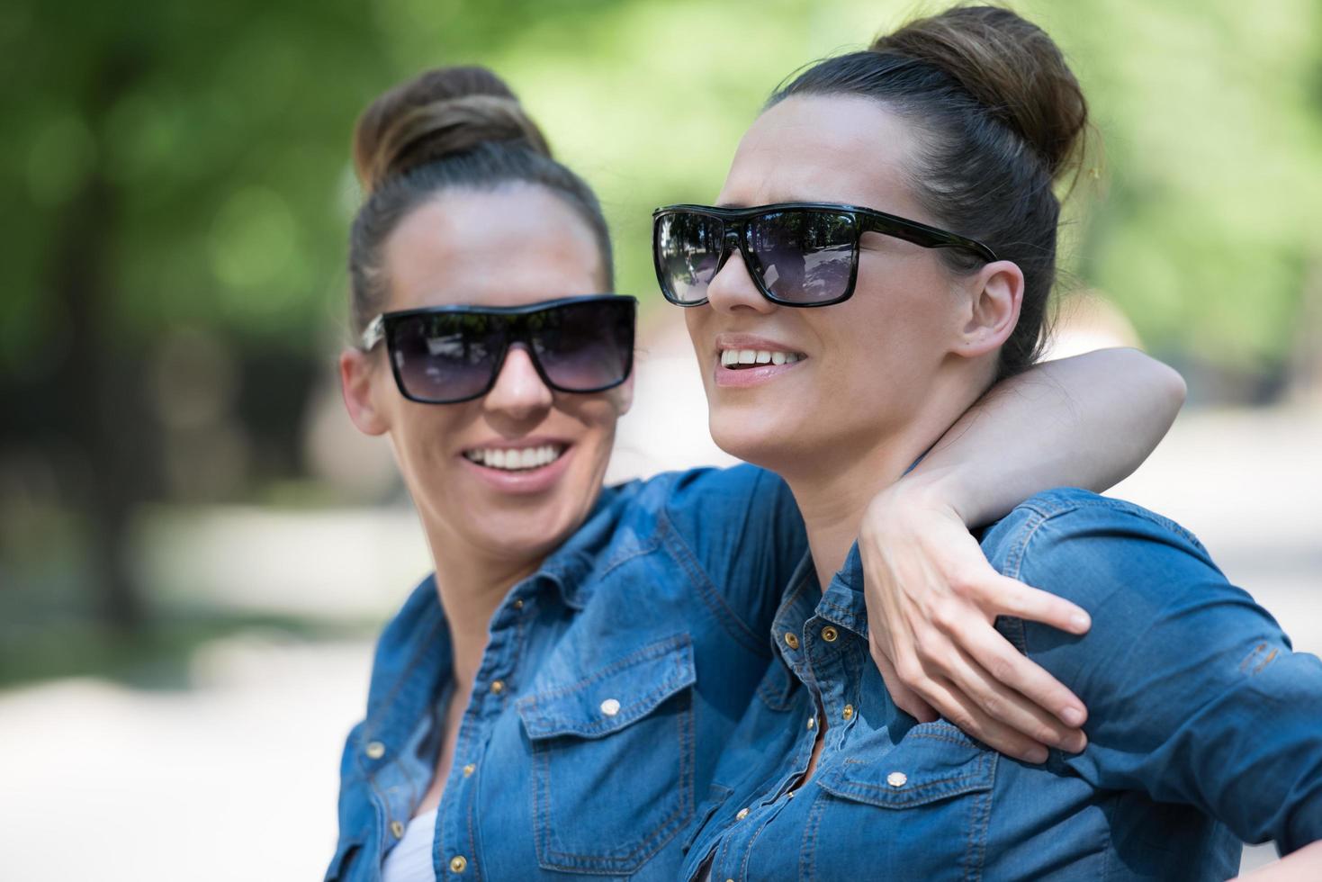 twin sister with sunglasses photo