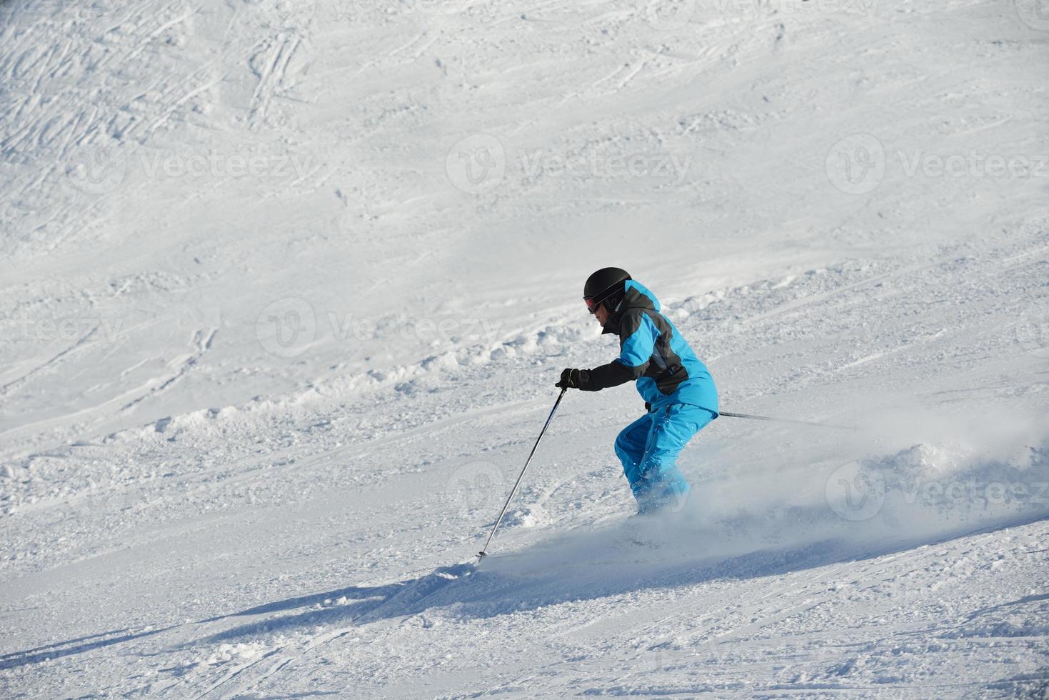 Skiers on mountain photo