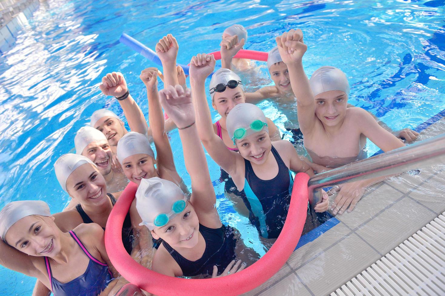 children group  at swimming pool photo