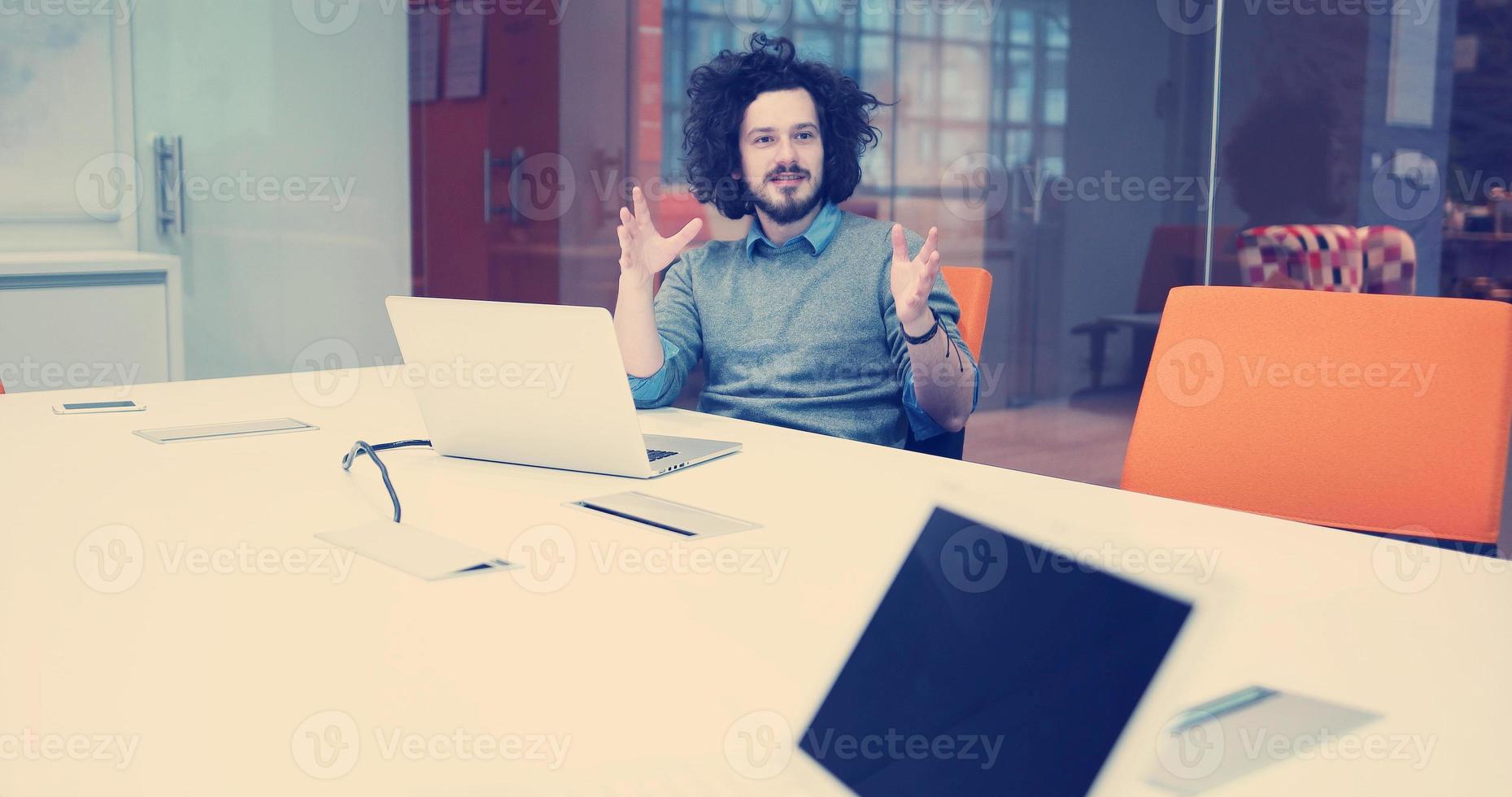 businessman working using a laptop in startup office photo