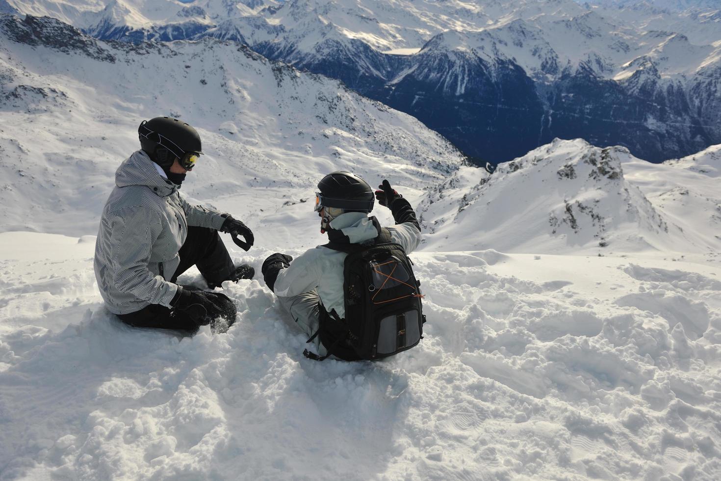 people group on snow at winter season photo