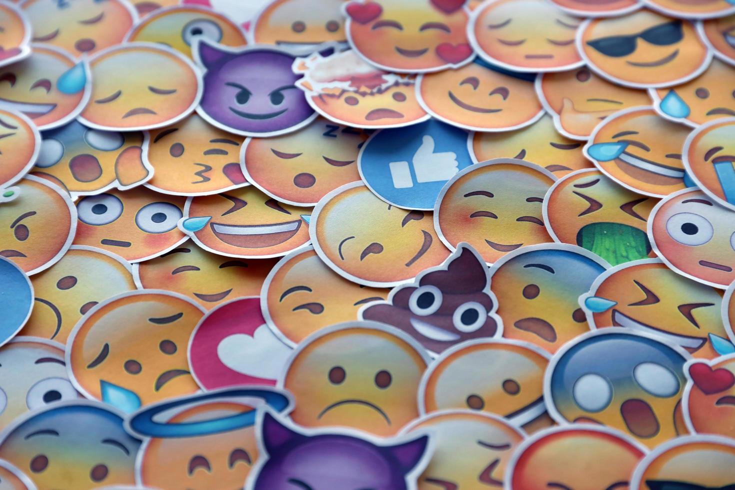 Ternopil, Ukraine - May 8, 2022 Large set of stickers with Emoji yellow faces. Emoji is a pictogram or smiley embedded in text and used in electronic messages and web page photo