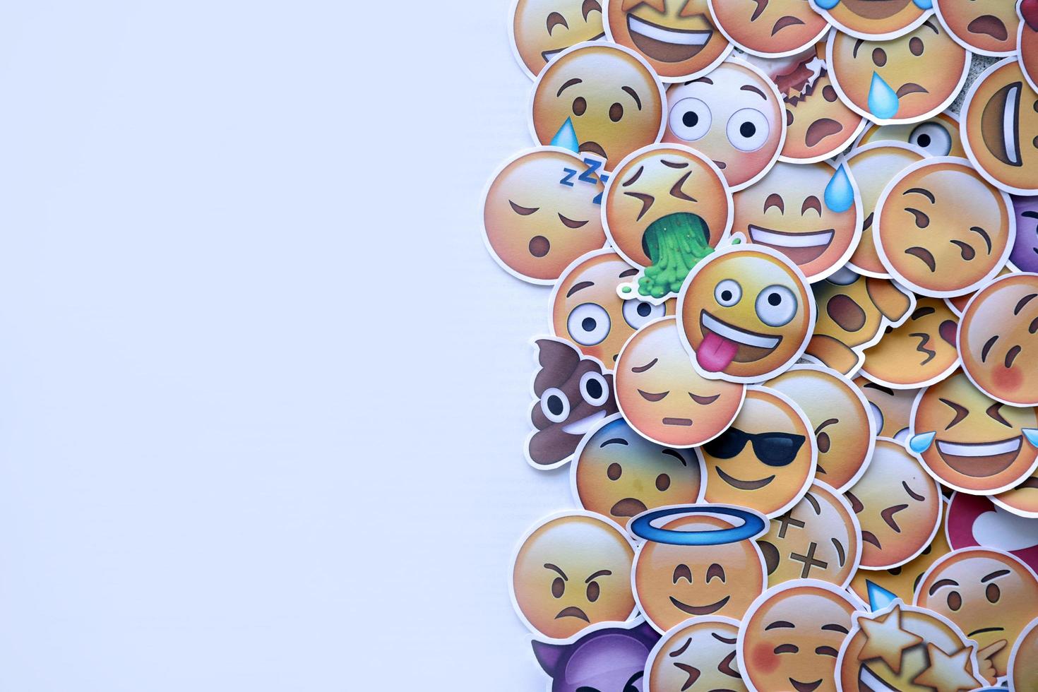 Ternopil, Ukraine - May 8, 2022 Large set of stickers with Emoji yellow faces. Emoji is a pictogram or smiley embedded in text and used in electronic messages and web page photo