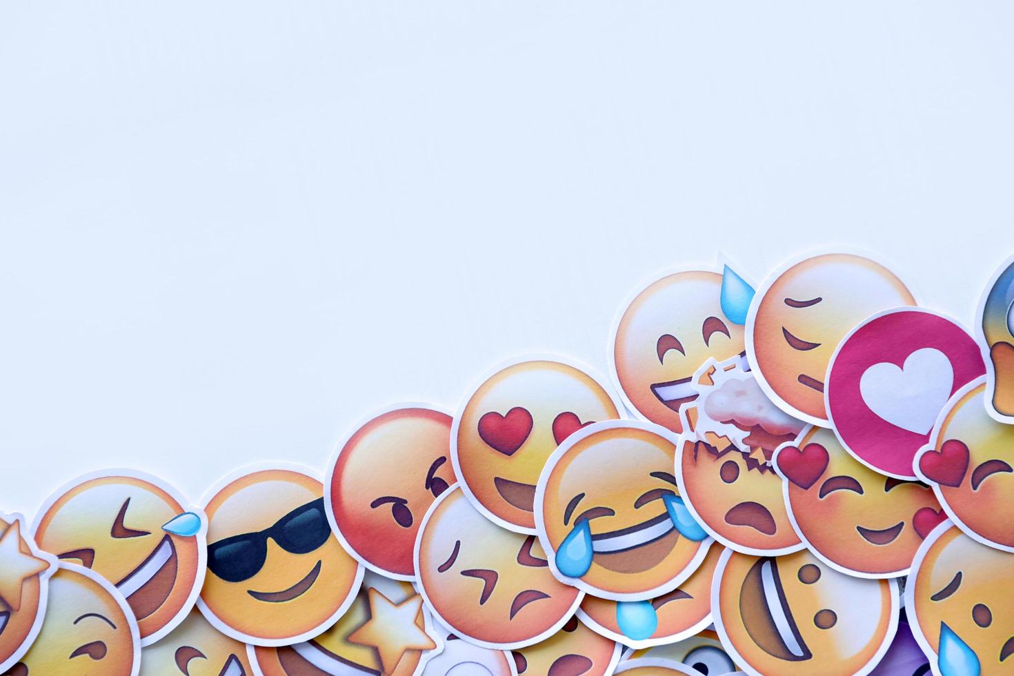 Ternopil, Ukraine - May 8, 2022 Large set of stickers with Emoji yellow faces. Emoji is a pictogram or smiley embedded in text and used in electronic messages and web page photo