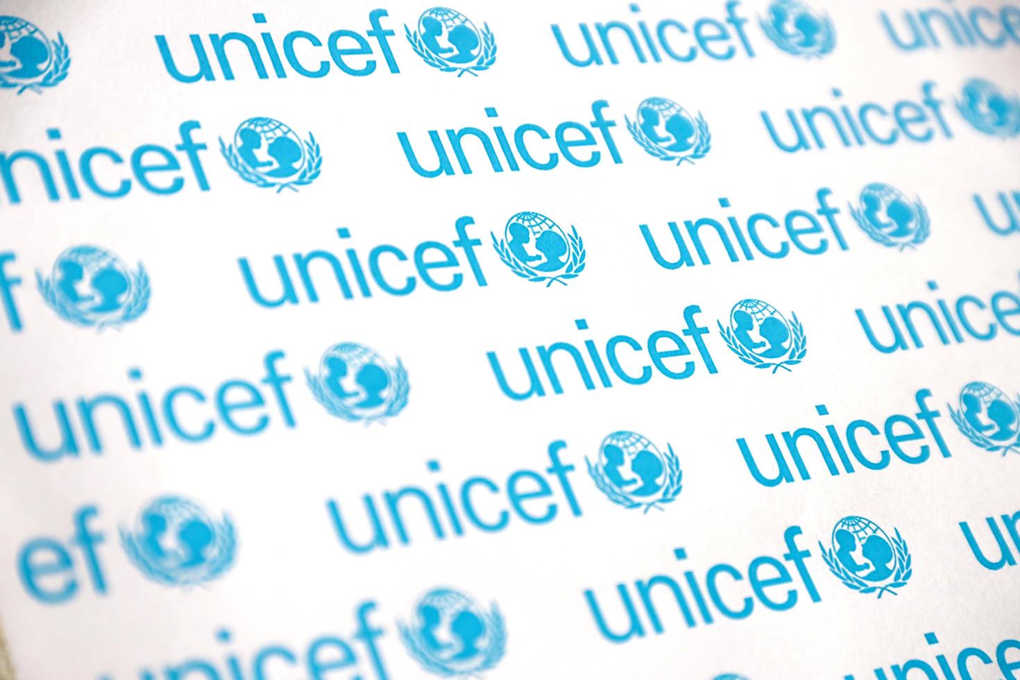 Ternopil, Ukraine - May 8, 2022 Unicef logo on paper. Unicef is a United Nations programm that provides humanitarian and developmental assistance to children and mothers photo
