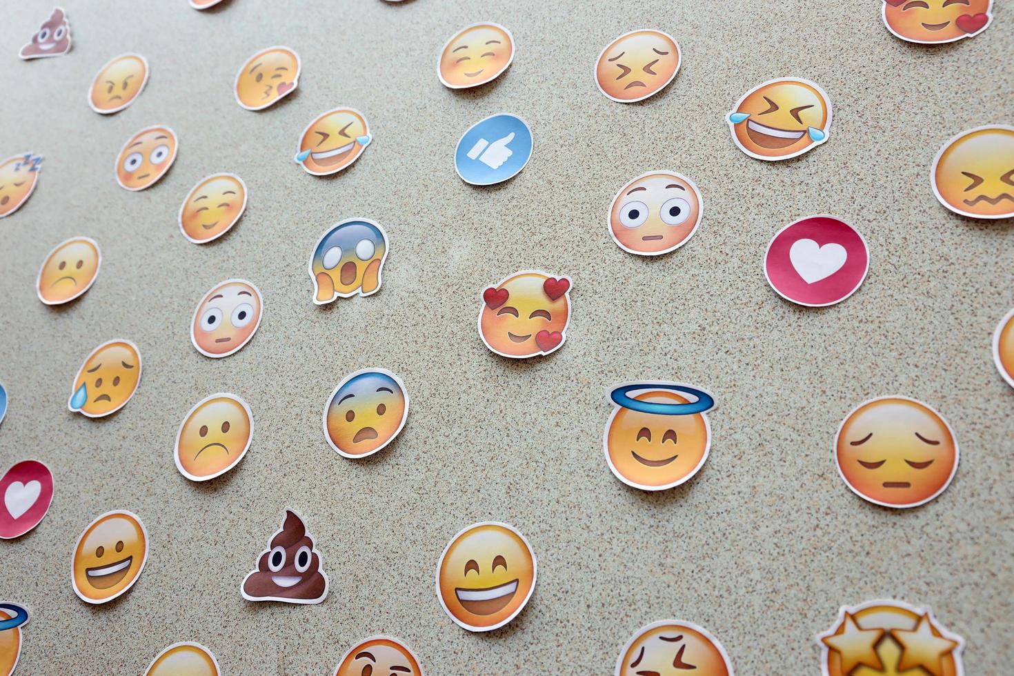 Ternopil, Ukraine - May 8, 2022 Large set of stickers with Emoji yellow faces. Emoji is a pictogram or smiley embedded in text and used in electronic messages and web page photo