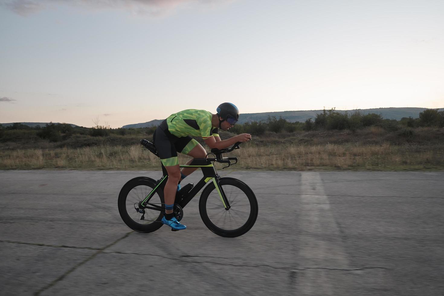 triathlon athlete riding a  bike photo