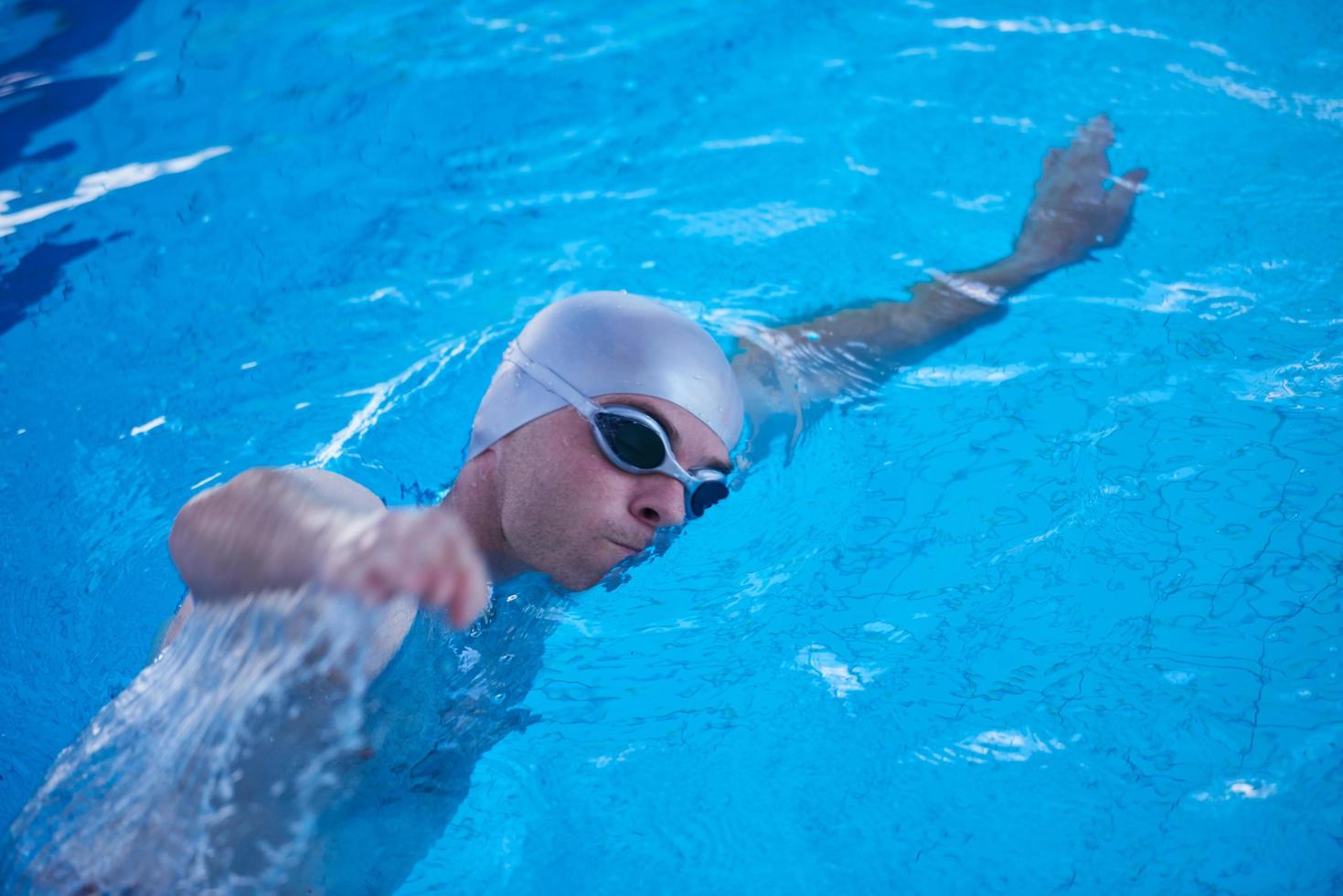 swimmer excercise on indoor swimming poo photo